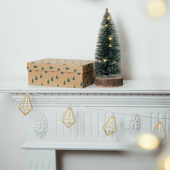 10 LED Gold Diamond Fairy Lights with a Christmas tree and box on mantel