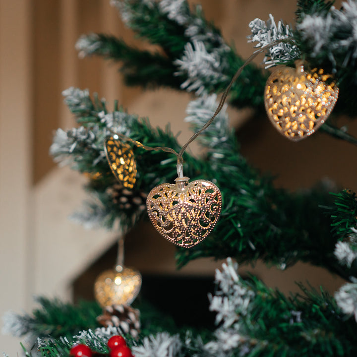 10 LED Silver Filigree Heart Fairy Lights used as Christmas tree decorations