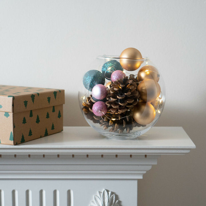 15 LED Bauble Fairy String Light displayed on glass bowl with pine cone