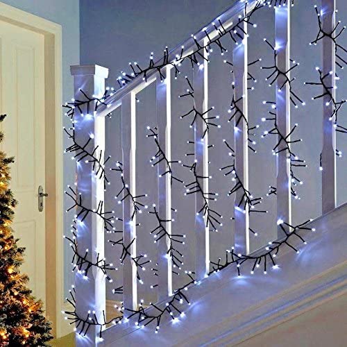 200 LED Timer Lights decorating a staircase and a Christmas tree