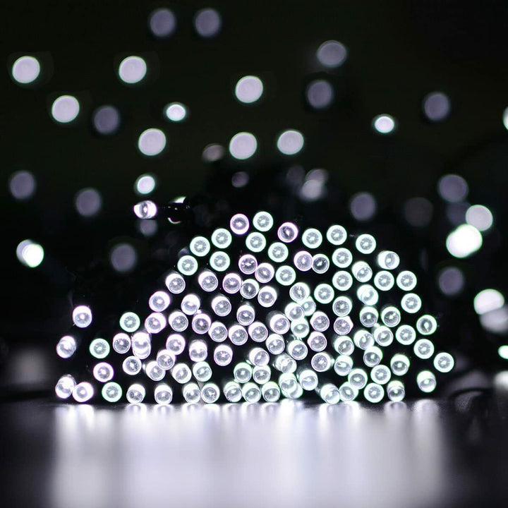 200 White LED Solar String Lights piled on a table
