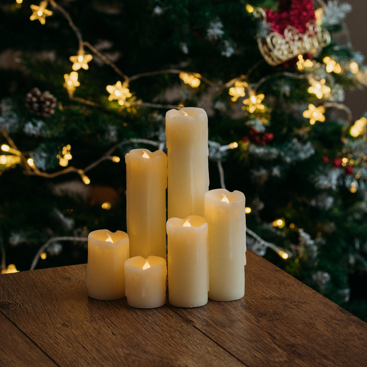 Six LED candles from the Drip Effect Candle Set arranged on a table